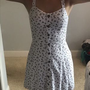 White Hollister dress with red roses and buttons